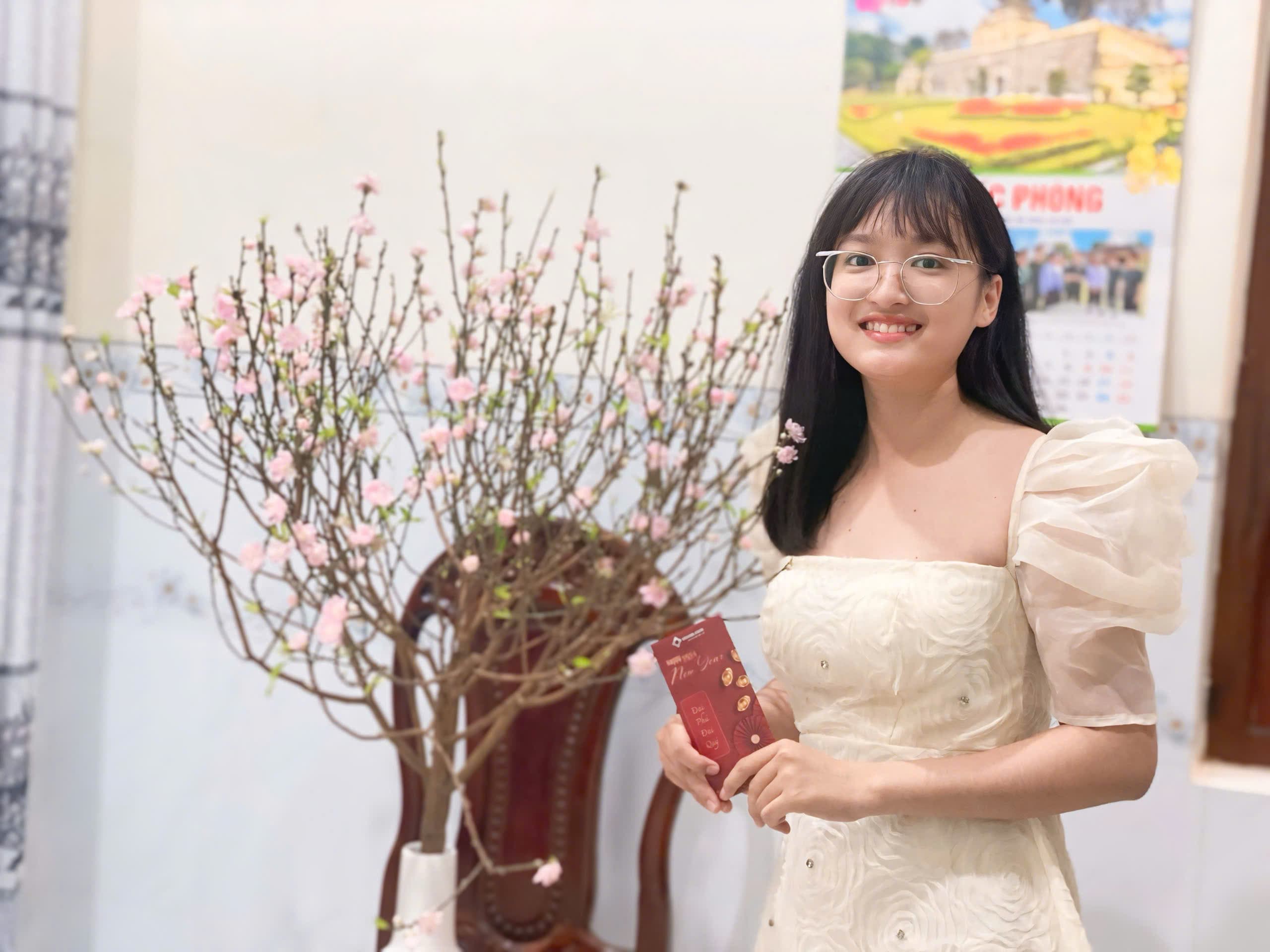 mua-xuan-trong-khung-kinh:-chan-dung-trong-treo-ben-canh-djao